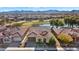 Aerial view of home with stunning mountain views and golf course location at 26573 W Abraham Ln, Buckeye, AZ 85396