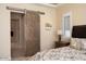 Large Primary bathroom with double vanity and granite countertops at 26573 W Abraham Ln, Buckeye, AZ 85396