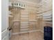 Spacious closet with custom shelving and hanging rods at 26573 W Abraham Ln, Buckeye, AZ 85396