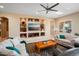 Living room with a view into the kitchen, showcasing an open floor plan at 26573 W Abraham Ln, Buckeye, AZ 85396