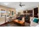 Open concept living room with a view of the kitchen and dining area at 26573 W Abraham Ln, Buckeye, AZ 85396