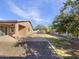 Spacious backyard with patio and mature lemon tree at 37803 W La Paz St, Maricopa, AZ 85138