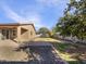 Spacious backyard with patio and mature lemon tree at 37803 W La Paz St, Maricopa, AZ 85138