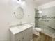 Updated bathroom with marble vanity, walk-in shower, and modern fixtures at 37803 W La Paz St, Maricopa, AZ 85138
