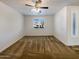 Bright bedroom with carpeted floors and window shutters at 37803 W La Paz St, Maricopa, AZ 85138