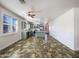 Modern kitchen with gray cabinets, island, and stainless steel appliances at 37803 W La Paz St, Maricopa, AZ 85138