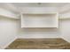 Spacious walk-in closet with double hanging rods and shelving at 37803 W La Paz St, Maricopa, AZ 85138