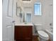 Bathroom with wood vanity and updated fixtures at 37855 W Merced St, Maricopa, AZ 85138
