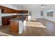 Spacious kitchen with island and ample cabinetry at 37855 W Merced St, Maricopa, AZ 85138