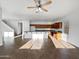 Open kitchen with island and stainless steel appliances at 37855 W Merced St, Maricopa, AZ 85138