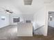 Spacious loft area with carpet and natural light at 37855 W Merced St, Maricopa, AZ 85138