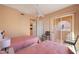 Bedroom with two twin beds and access to balcony at 3800 S Cantabria Cir # 1029, Chandler, AZ 85248