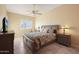Main bedroom with large bed and neutral decor at 3800 S Cantabria Cir # 1029, Chandler, AZ 85248
