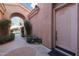 Front entry with arched walkway and landscaping at 3800 S Cantabria Cir # 1029, Chandler, AZ 85248