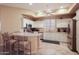 Kitchen with white cabinets and granite countertops at 3800 S Cantabria Cir # 1029, Chandler, AZ 85248