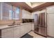 Kitchen with white cabinets and stainless steel appliances at 3800 S Cantabria Cir # 1029, Chandler, AZ 85248