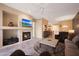 Living room with fireplace and access to dining area at 3800 S Cantabria Cir # 1029, Chandler, AZ 85248