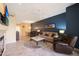 Comfortable living room with fireplace and large TV at 3800 S Cantabria Cir # 1029, Chandler, AZ 85248