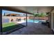 Inviting backyard oasis with a covered patio, refreshing pool, and ample space for relaxation and entertainment at 6352 W Campo Bello Dr, Glendale, AZ 85308