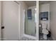 Modern bathroom with glass-enclosed shower and stylish patterned flooring at 6352 W Campo Bello Dr, Glendale, AZ 85308
