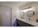 Bathroom featuring a double vanity with modern fixtures and ample counter space at 6352 W Campo Bello Dr, Glendale, AZ 85308