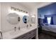 Bathroom featuring a double vanity with modern fixtures and ample counter space at 6352 W Campo Bello Dr, Glendale, AZ 85308