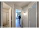 Hallway with doorways leading to a bathroom and bedroom at 6352 W Campo Bello Dr, Glendale, AZ 85308