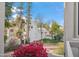 View from the balcony overlooking the beautiful landscaping and neighborhood architecture at 6411 S River Dr # 10, Tempe, AZ 85283