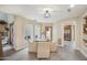 Bright dining area with neutral decor, connecting seamlessly to an outdoor space and the kitchen at 6411 S River Dr # 10, Tempe, AZ 85283