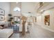 Spacious living room featuring high ceilings, ample natural light, and stylish decor creating an inviting atmosphere at 6411 S River Dr # 10, Tempe, AZ 85283