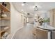 Expansive living area with elegant furnishings, curved walls, and an open layout with a modern staircase feature at 6411 S River Dr # 10, Tempe, AZ 85283