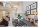 Comfortable living room with a modern fireplace, statement staircase, and sophisticated decor for a relaxing ambiance at 6411 S River Dr # 10, Tempe, AZ 85283