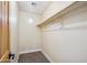 Walk-in closet with carpet floors and shelving at 6411 S River Dr # 10, Tempe, AZ 85283