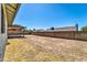 Large backyard with covered patio and block wall at 6427 W Turquoise Ave, Glendale, AZ 85302
