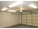 Garage interior with an automatic garage door opener at 6427 W Turquoise Ave, Glendale, AZ 85302