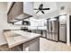 Spacious kitchen boasts stainless steel appliances and granite countertops at 6427 W Turquoise Ave, Glendale, AZ 85302
