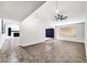 Open and spacious living room with high ceilings and tile floors at 6427 W Turquoise Ave, Glendale, AZ 85302
