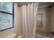 Clean bathroom with shower/tub combo and updated tile at 10410 N Cave Creek Rd # 2232, Phoenix, AZ 85020