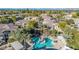 Community view showcasing the pool and buildings at 11000 N 77Th Pl # 1004, Scottsdale, AZ 85260