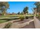 Landscaped backyard with golf course view at 11000 N 77Th Pl # 1004, Scottsdale, AZ 85260