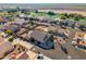 An aerial view of a residential neighborhood near a golf course at 11623 W Lemon Ct, Surprise, AZ 85378
