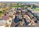 Aerial view of a residential neighborhood with golf course proximity at 11623 W Lemon Ct, Surprise, AZ 85378