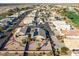 Aerial view showcasing a home's location within a residential community with golf course views at 11623 W Lemon Ct, Surprise, AZ 85378