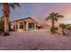 Spacious backyard with gravel and desert landscaping at 11623 W Lemon Ct, Surprise, AZ 85378