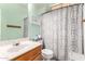 Clean bathroom with a shower/tub combo and patterned curtain at 11623 W Lemon Ct, Surprise, AZ 85378