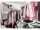 Large walk-in closet with ample shelving at 11623 W Lemon Ct, Surprise, AZ 85378