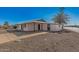 Single-story home with a landscaped yard at 12450 N Cherry Hills W Dr, Sun City, AZ 85351