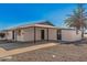 House exterior featuring a modern design and covered porch at 12450 N Cherry Hills W Dr, Sun City, AZ 85351