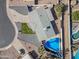 Aerial view showing house, pool, and yard at 1344 E Ellis Cir, Mesa, AZ 85203