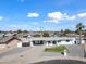 Aerial view of a single-story house with a front yard and driveway at 1344 E Ellis Cir, Mesa, AZ 85203